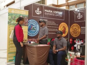 Mara Coffee representatives welcoming a visitor at their exhibition stand